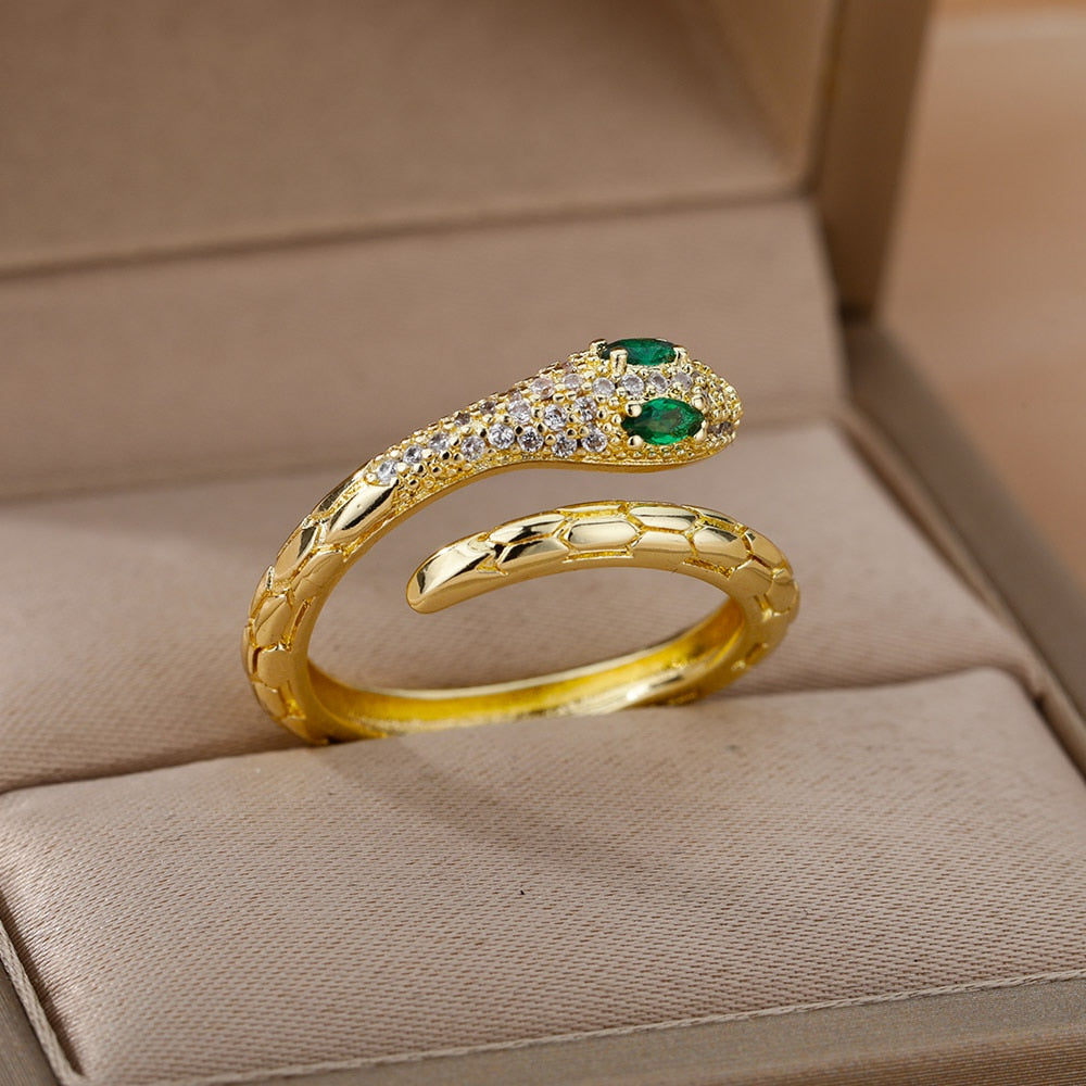 Gold Serpent Ring with Gemstone Centerpiece